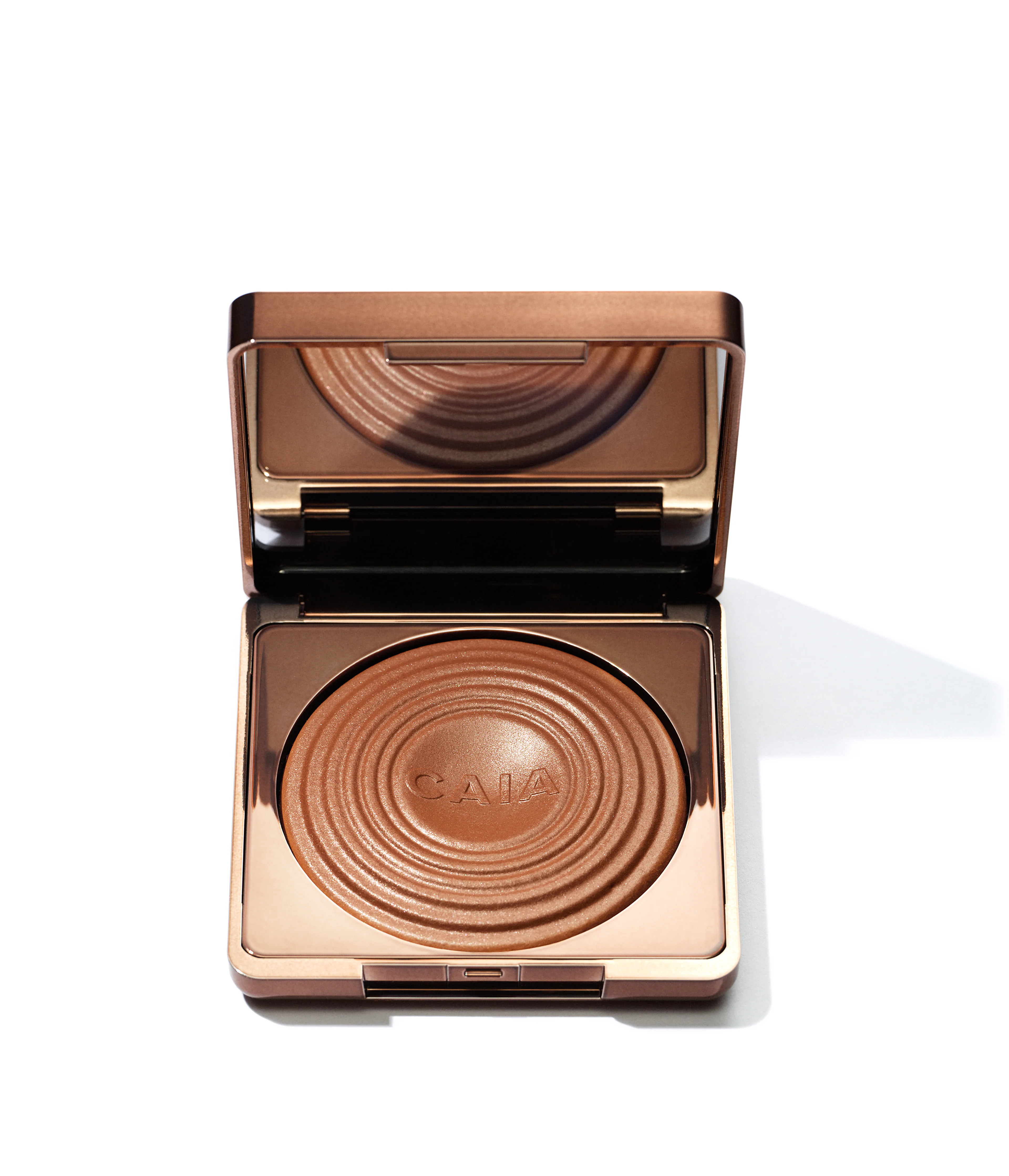 Glow Bronzer Antigua von Caia Cosmetics für einen warmen Teint.