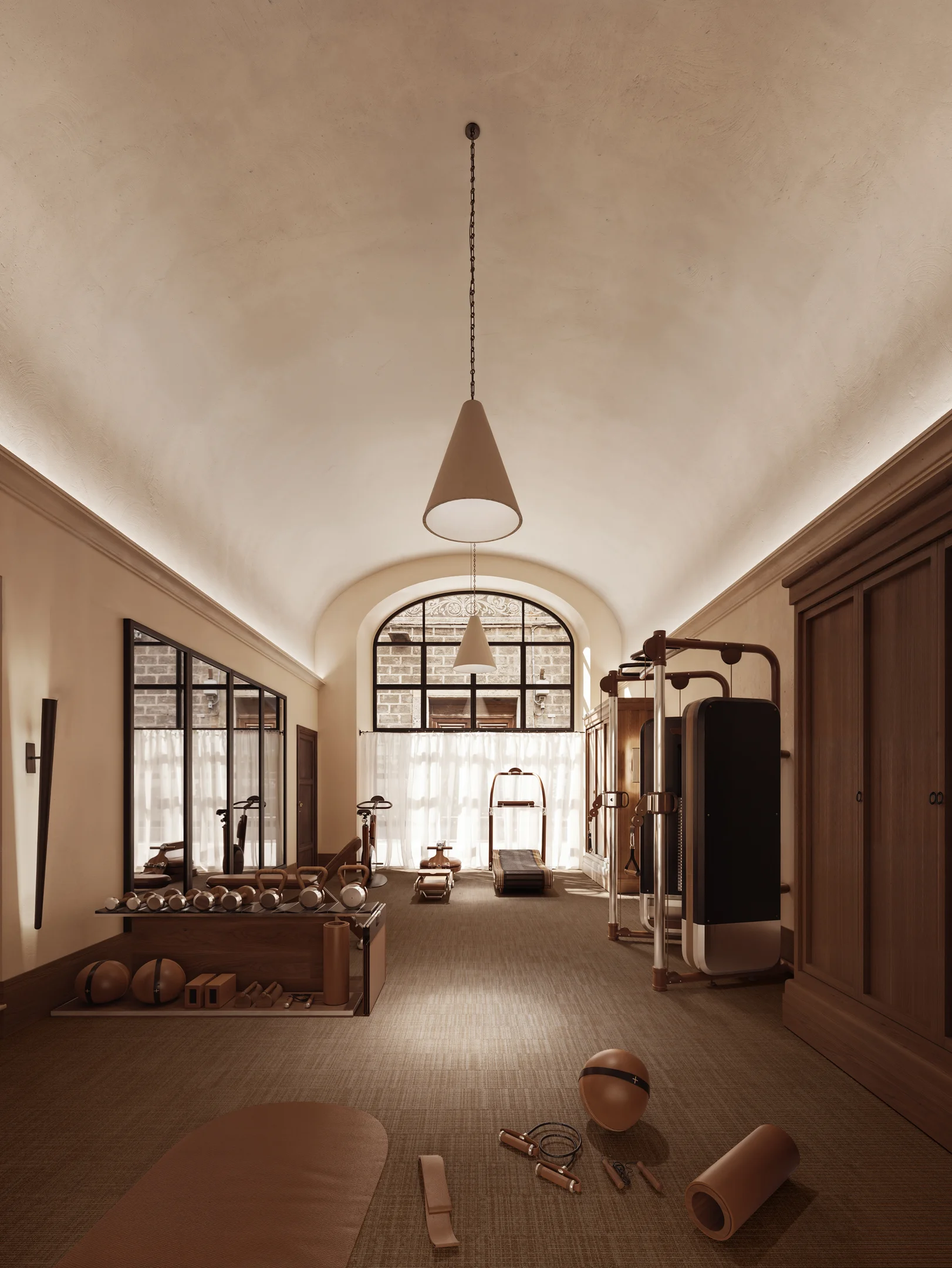 Fitnessraum im La Réserve Firenze Hotel mit modernem Equipment im historischen Gebäude