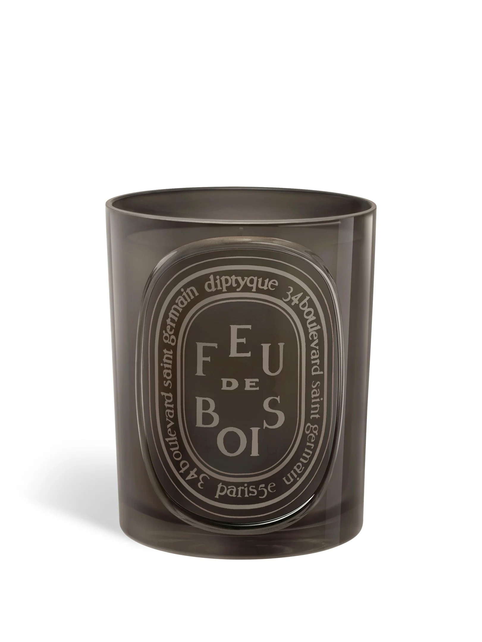 Graue Diptyque Feu de Bois Duftkerze 300g auf hellem Hintergrund