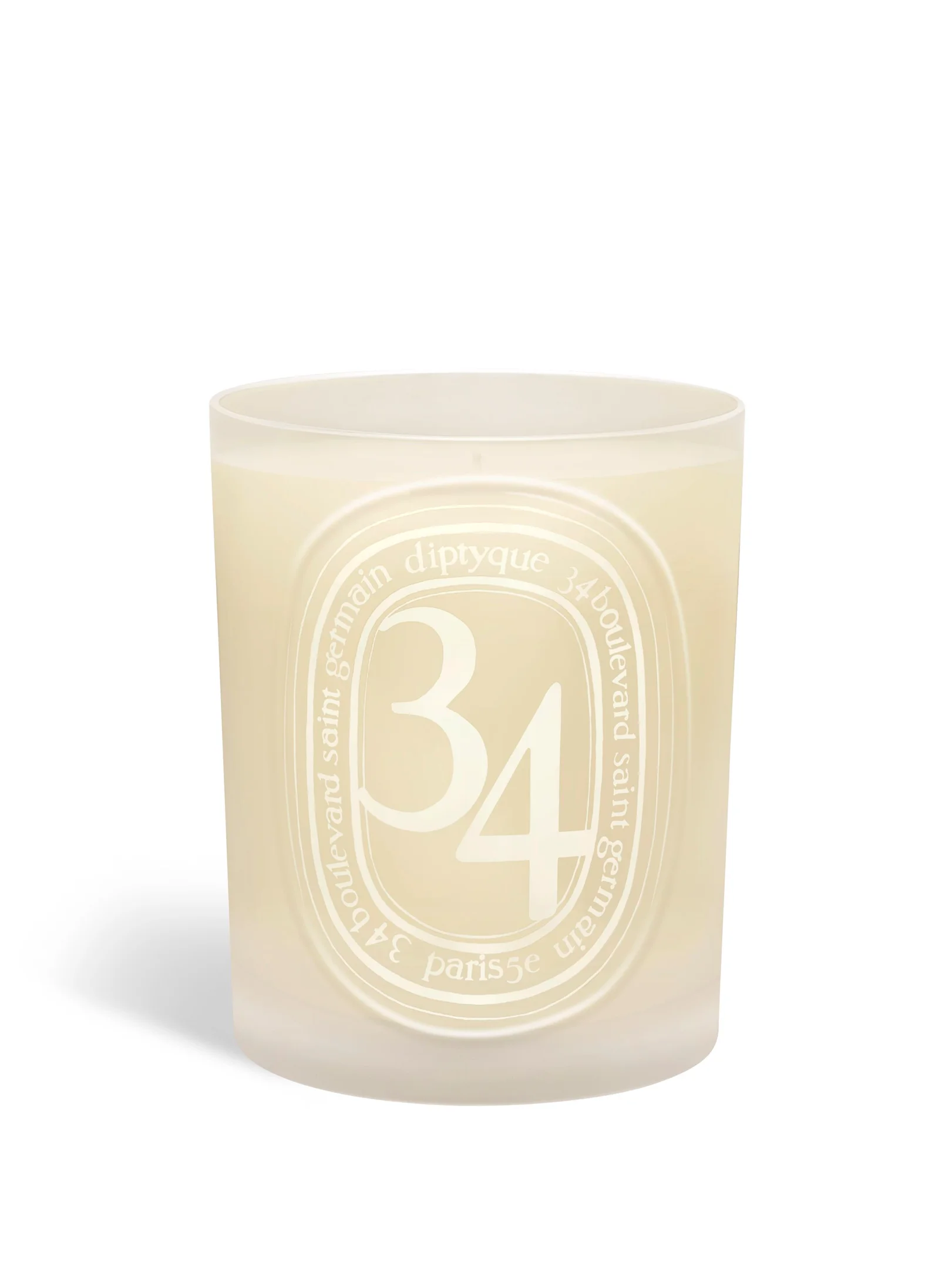 Diptyque 34 Boulevard Saint Germain Duftkerze 300g im cremefarbenen Glas auf hellem Hintergrund